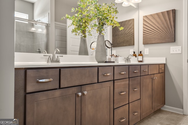 bathroom with vanity and an enclosed shower