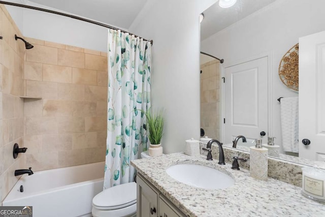 full bathroom featuring vanity, shower / tub combo with curtain, and toilet