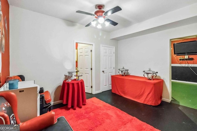 interior space featuring ceiling fan