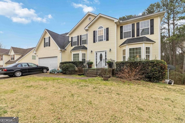 view of front of property featuring a garage and a front lawn