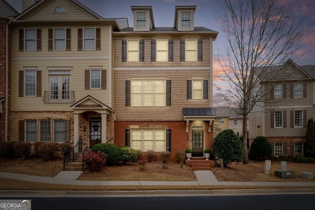 view of front facade with brick siding