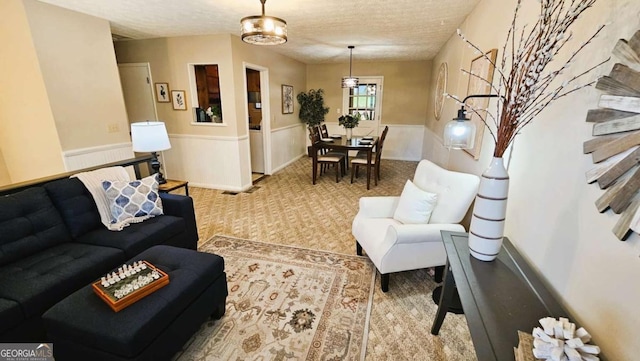 living room featuring a textured ceiling