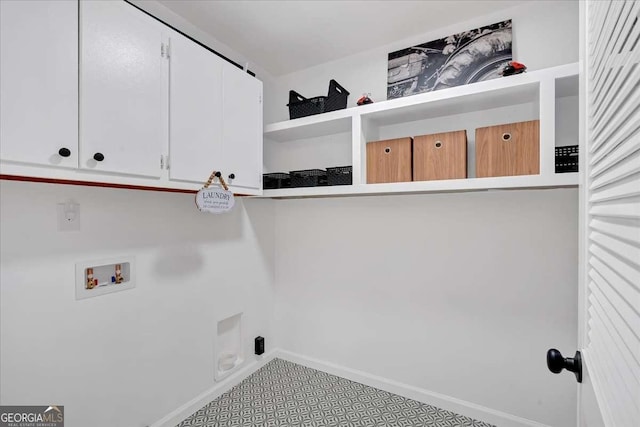 laundry area featuring cabinets, hookup for an electric dryer, and washer hookup