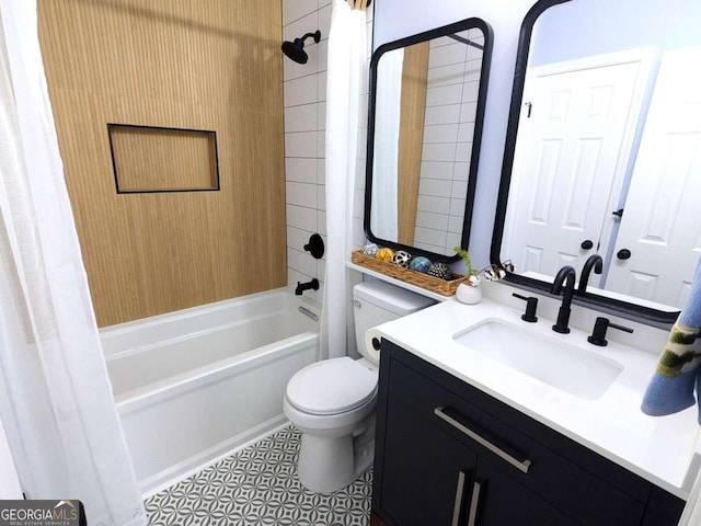 full bathroom with vanity, toilet, and shower / bath combo with shower curtain