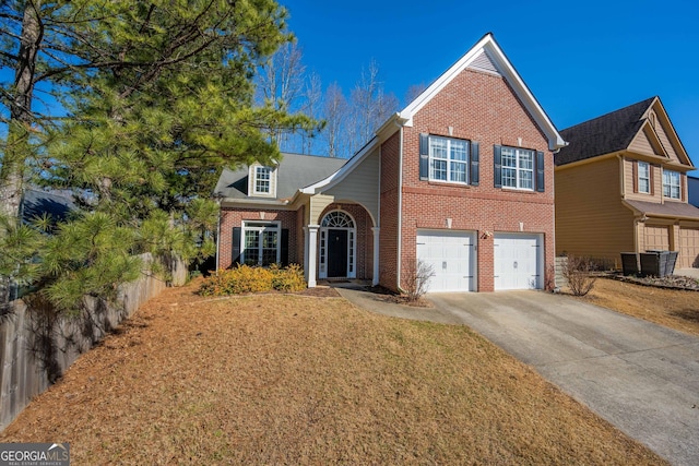 view of front facade featuring a garage and a front yard