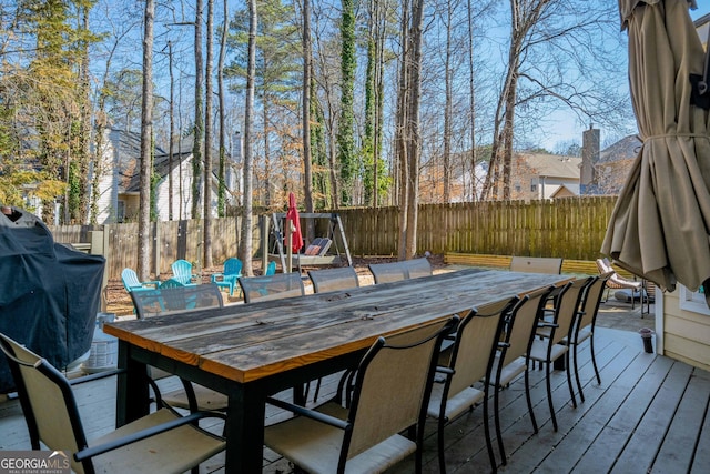 wooden deck with an outdoor bar