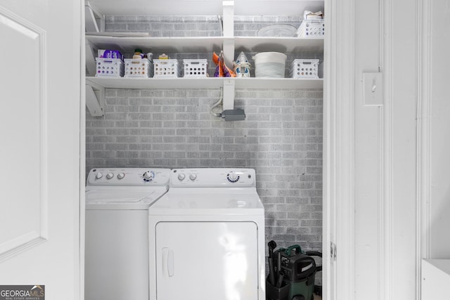 laundry room featuring washer and dryer