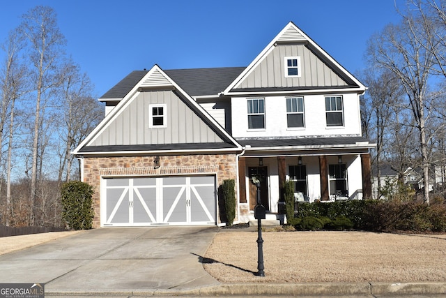 view of front facade featuring a garage and a porch