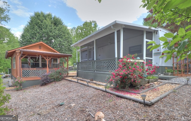 170 Tip Top Cir, Cleveland, GA 30528 - view of front of home with a porch and a sunroom