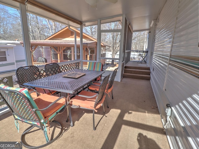 170 Tip Top Cir, Cleveland, GA 30528 - sunroom / solarium featuring a ceiling fan and outdoor dining space