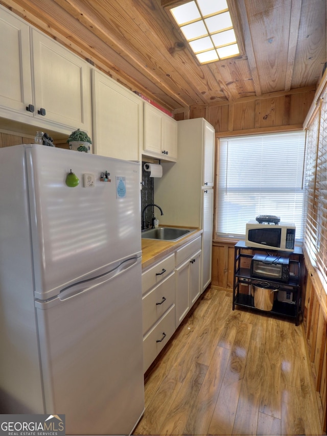 170 Tip Top Cir, Cleveland, GA 30528 - kitchen featuring white appliances, wood ceiling, white cabinets, and a sink