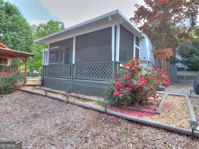 170 Tip Top Cir, Cleveland, GA 30528 - view of side of home featuring a sunroom