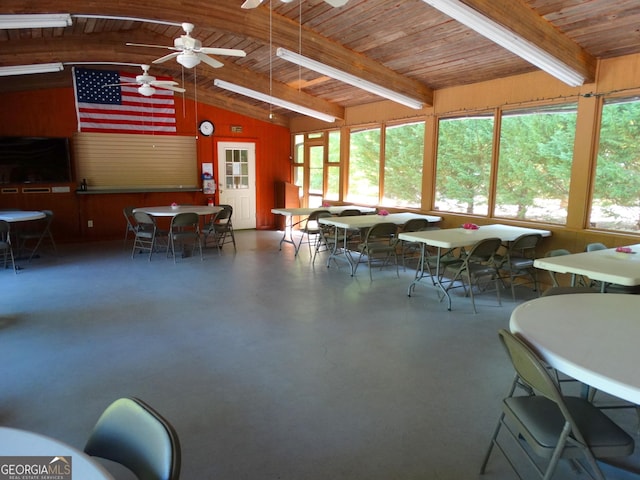 dining room with wooden ceiling, a healthy amount of sunlight, and vaulted ceiling with beams