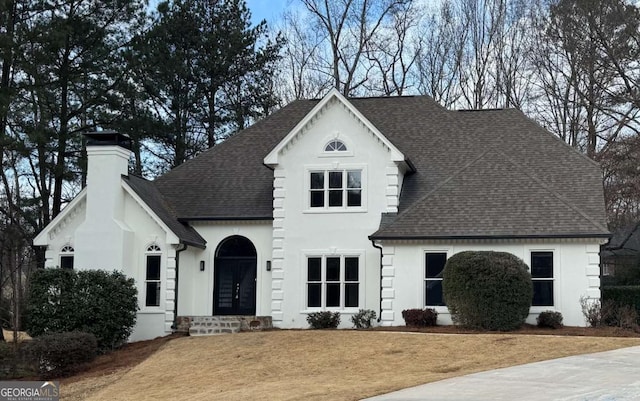 view of front of home with a front lawn