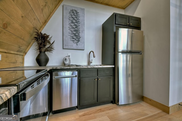 kitchen with electric range, light stone counters, wood ceiling, and freestanding refrigerator