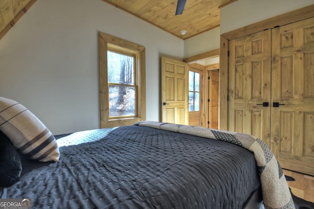 bedroom with wood ceiling and ceiling fan