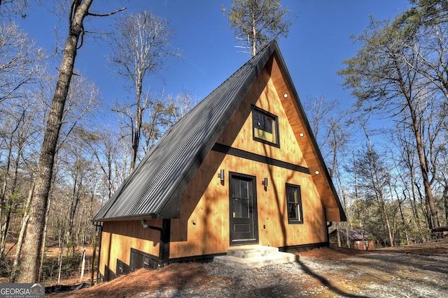 a-frame home with metal roof