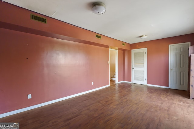 unfurnished bedroom featuring hardwood / wood-style floors