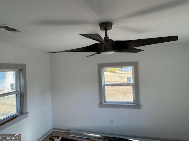 spare room with ceiling fan