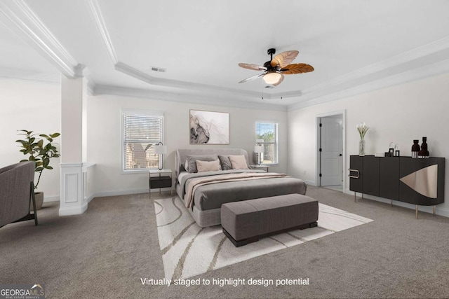 bedroom with ceiling fan, light colored carpet, ornamental molding, and a raised ceiling