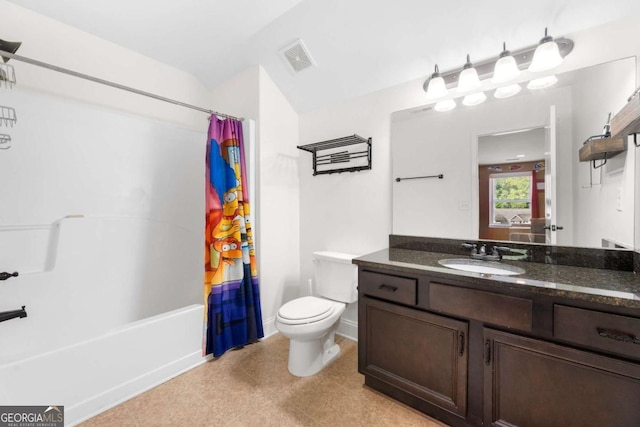 full bathroom with shower / tub combo with curtain, vanity, and toilet