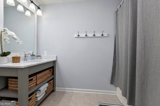 bathroom with vanity and tile patterned floors