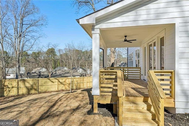 exterior space with ceiling fan