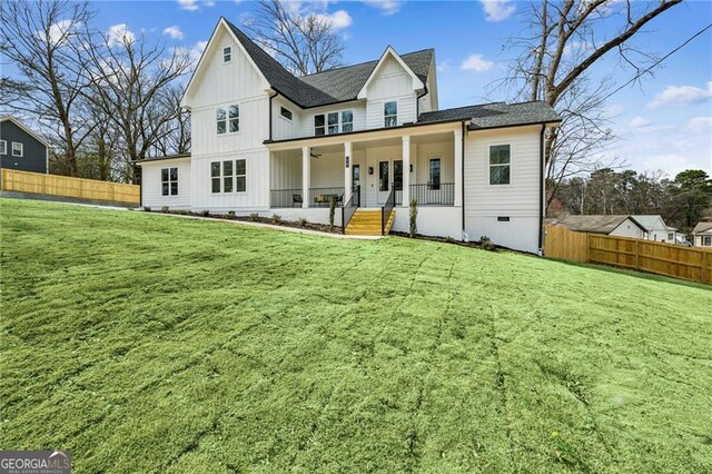 exterior space featuring a garage and covered porch