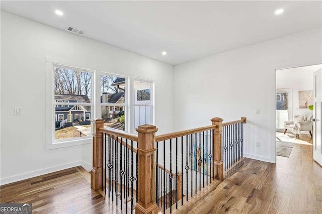 corridor featuring hardwood / wood-style flooring