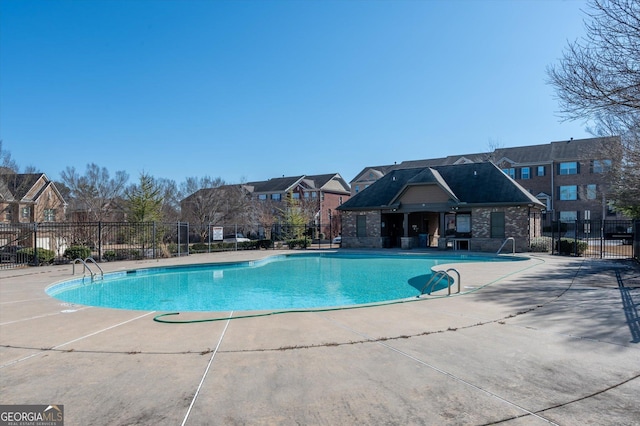 view of pool featuring a patio area