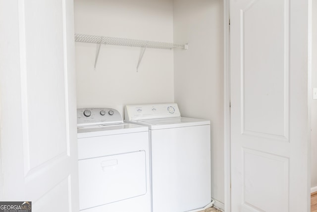 laundry room with washing machine and dryer and laundry area