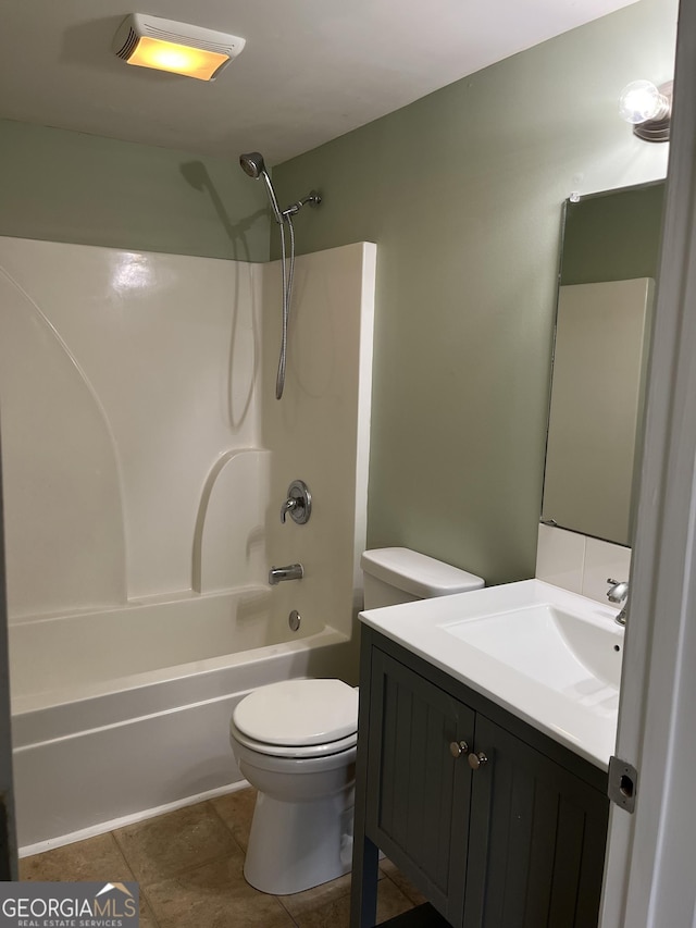 full bathroom with vanity, tile patterned flooring, tub / shower combination, and toilet