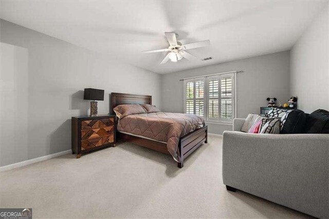 carpeted office featuring lofted ceiling