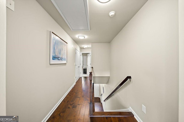 hall with dark hardwood / wood-style floors