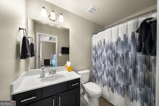 bathroom with vanity, tile patterned flooring, toilet, and a shower with shower curtain