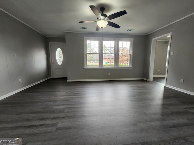 entryway featuring ornamental molding, dark hardwood / wood-style floors, and ceiling fan