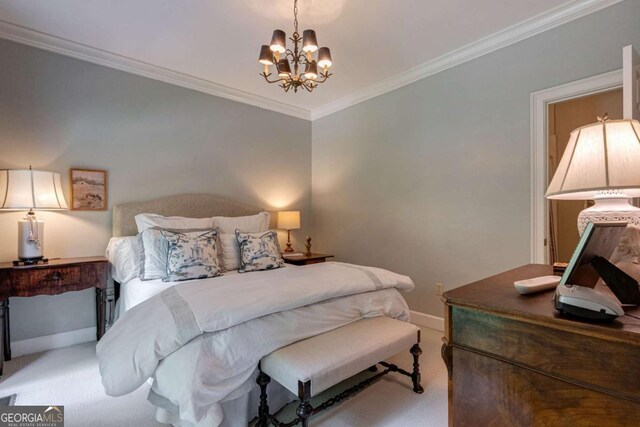 carpeted bedroom featuring crown molding and a chandelier