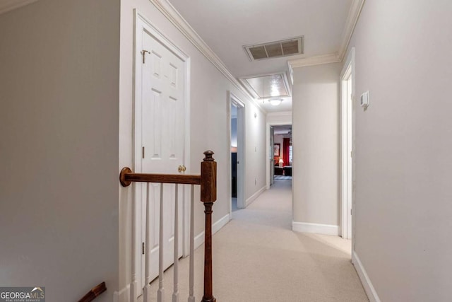 hall featuring light carpet and ornamental molding