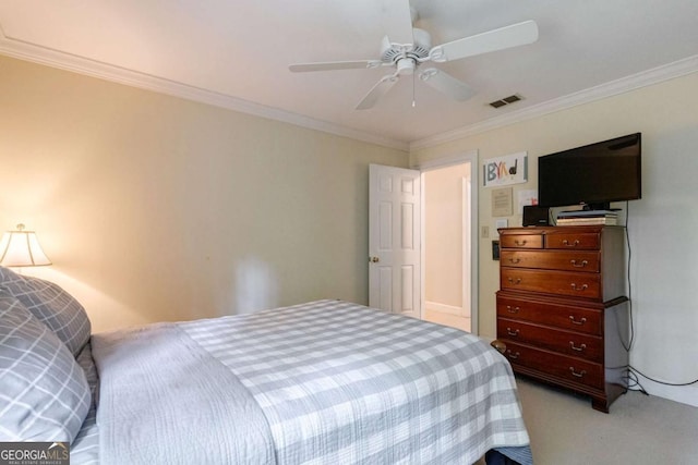 bedroom featuring light carpet, ornamental molding, and ceiling fan