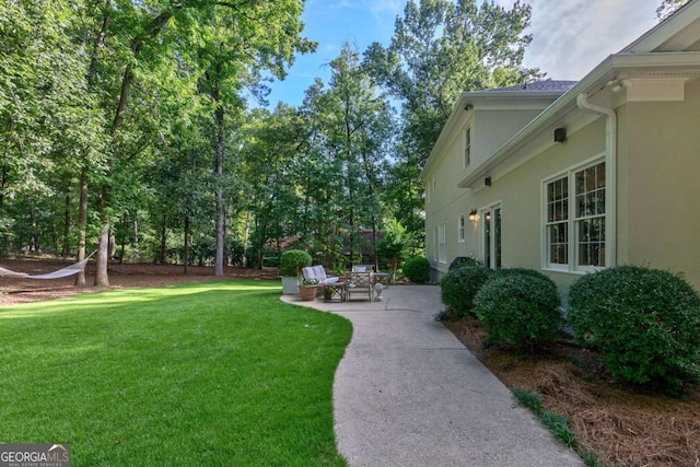 view of yard with a patio area