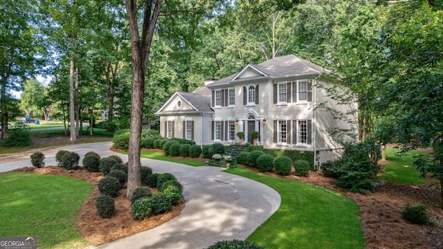 colonial house with a front yard