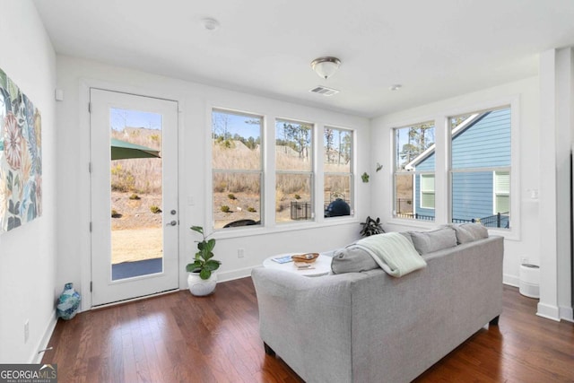 living room with dark hardwood / wood-style floors