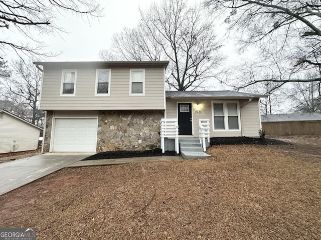 split level home with a garage