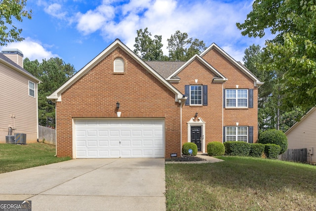 view of front of home featuring a garage, a front lawn, and central air condition unit