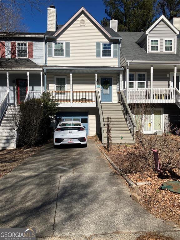 view of front of home with a garage and covered porch