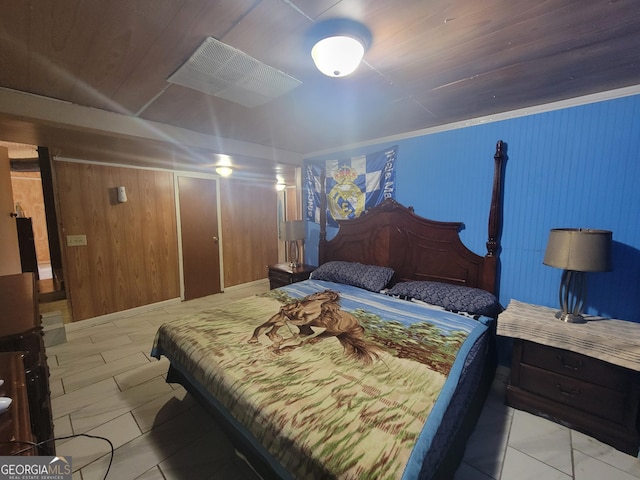 bedroom featuring a closet and wooden ceiling