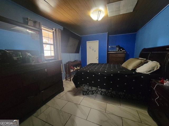 bedroom with wood ceiling