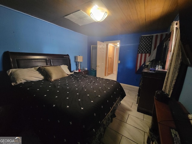 bedroom with wood ceiling