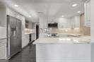 kitchen featuring white cabinetry