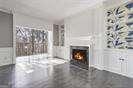 unfurnished living room featuring concrete floors